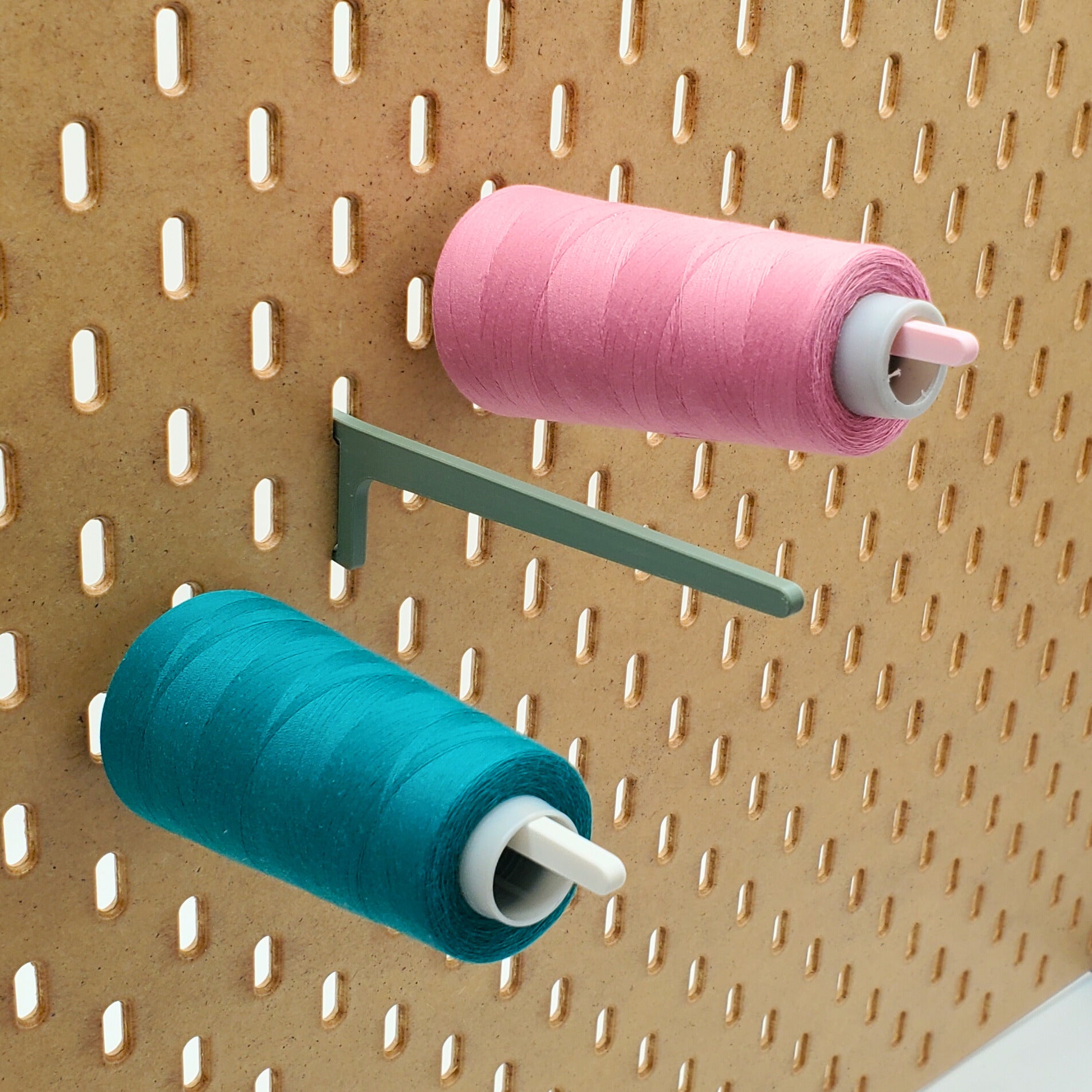 Large Thread Hooks ok a skadis board, White and pink hooks have large cone threads