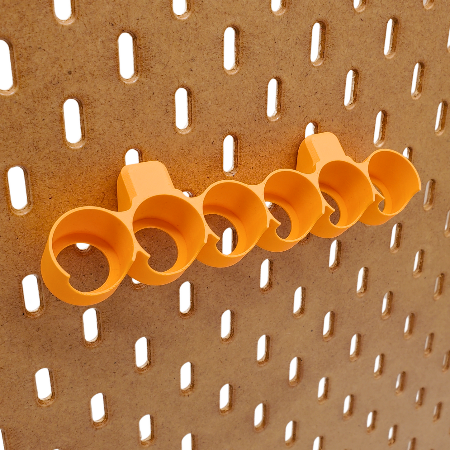 A single Sunrise Orange Paint rack