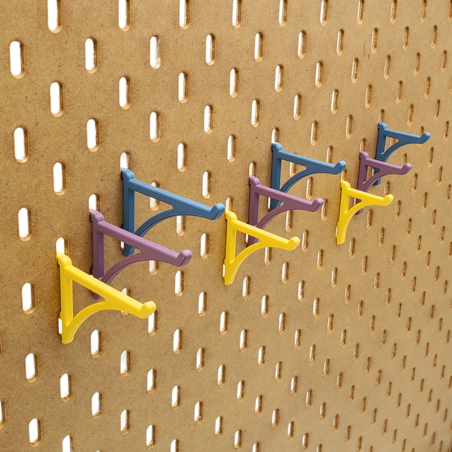 SKADIS Pegboard hooks in three different color in three different sizes.