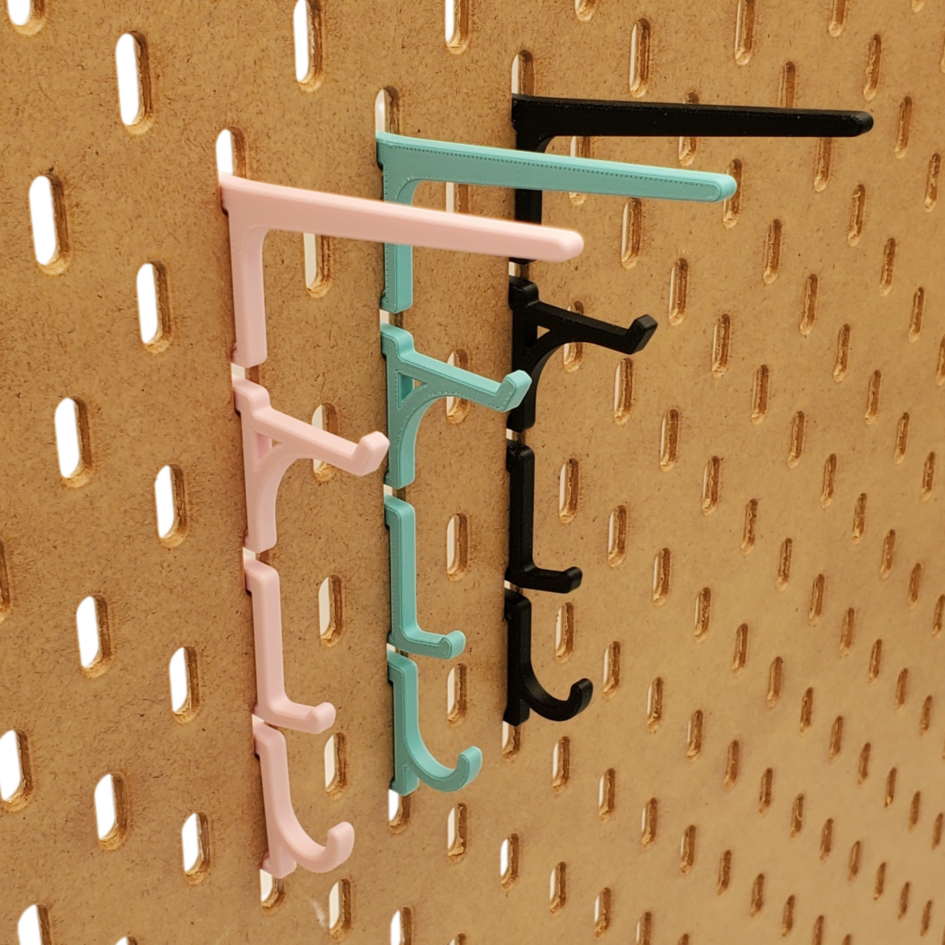 Ikea Skadis pegboard compatible Display Hooks in teal, pink and black