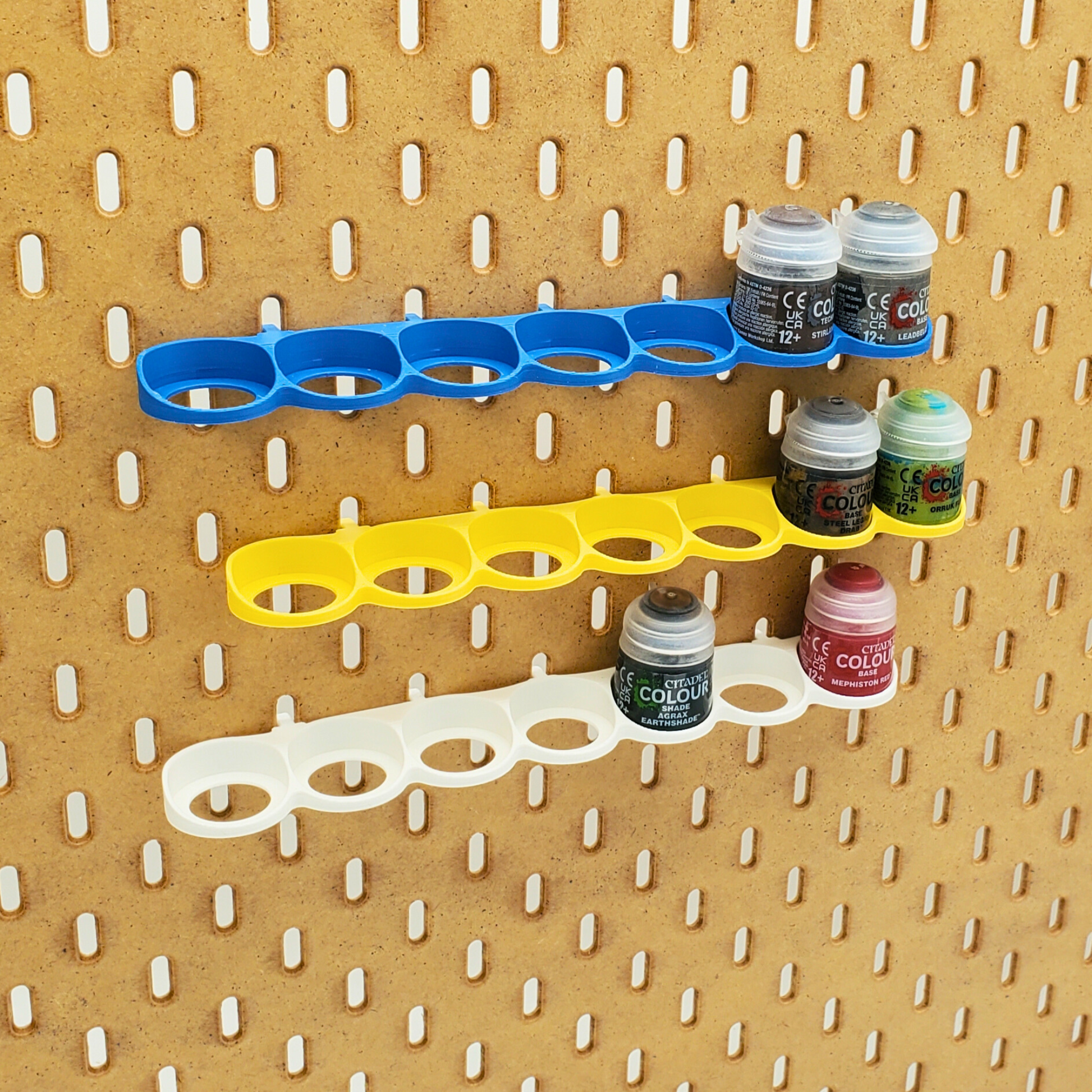 Sapphire Blue, Savannah Yellow and Cotton White Paint racks