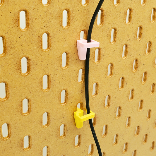 Light Pink and Savannah Yellow Vertical Wire Clips for IKEA SKADIS Pegboard