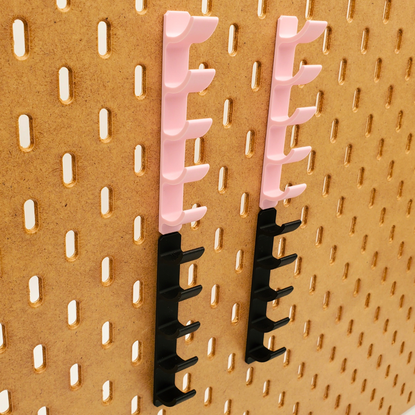 IKEA Pegboard 5 mini shelf Brush storage in light pink and charcoal black.