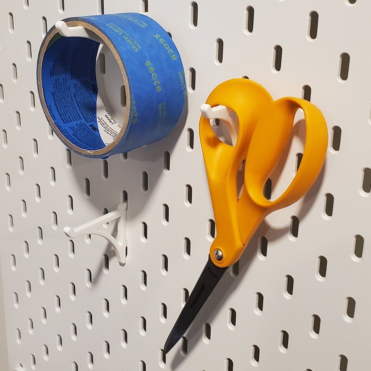 Platform hook versatility abounds with Scissor and tape storage!